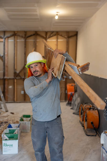 real people photo of a hispanic latin construction worker on a job site.